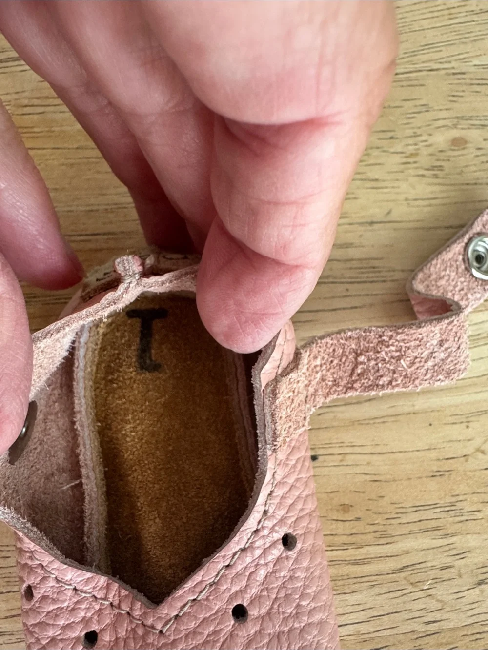 Duchess & Fox soft pink infant shoes.